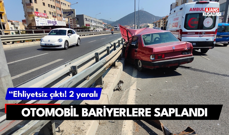 Otomobil bariyerlere saplandı: 2 yaralı